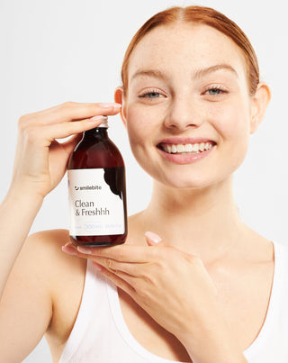 Ústní voda s mátovou příchutí a účinkem proti zubnímu kazu Smilebite - 2